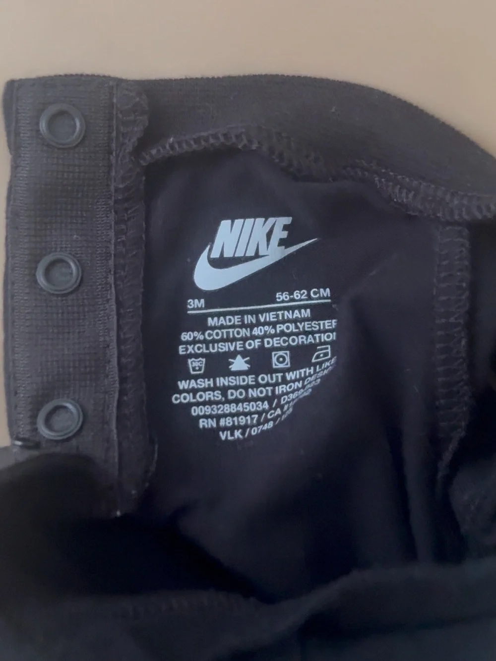 Nike Black Infant Bodysuit with White Logo